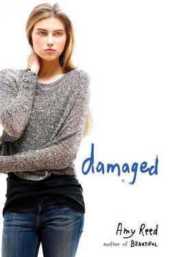 Damaged by author Amy Reed